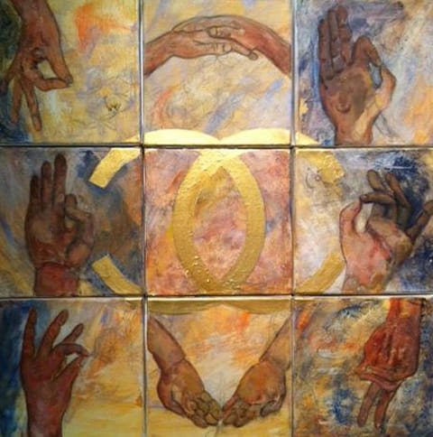 Grid of nine painted human hands in varied gestures around a central golden oval; ochre, terracotta, blue tones