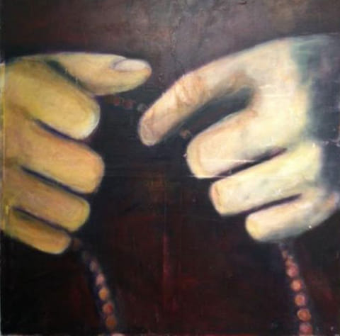 Two pale cream-toned hands loosely holding an amber-beaded rosary against a dark maroon and brown background, soft oil painting